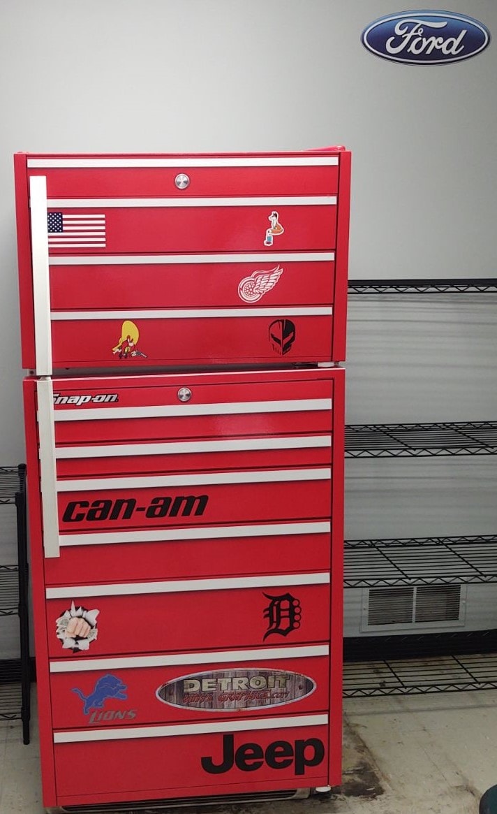 Custom vinyl decals on a red tool chest