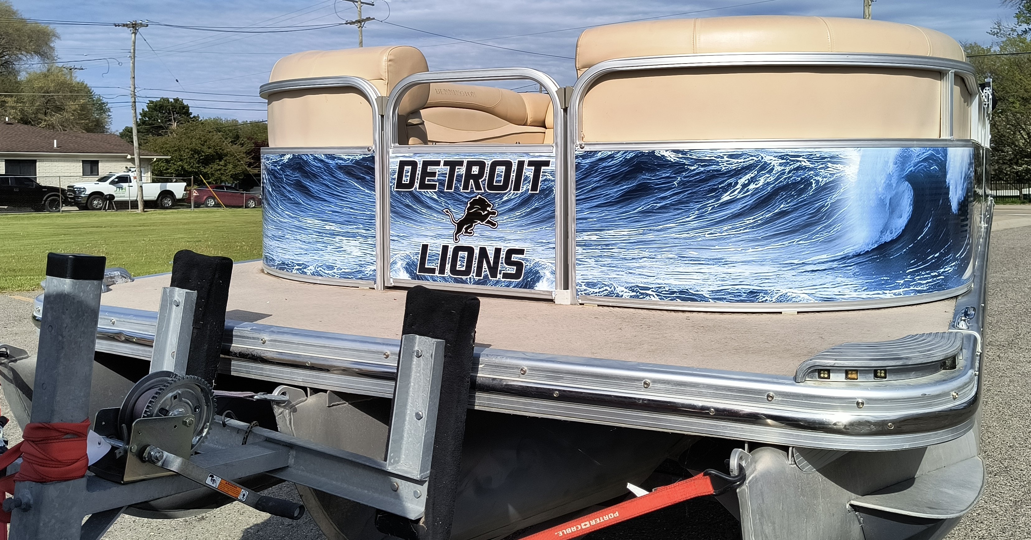 Detroit Lions themed pontoon boat front graphics