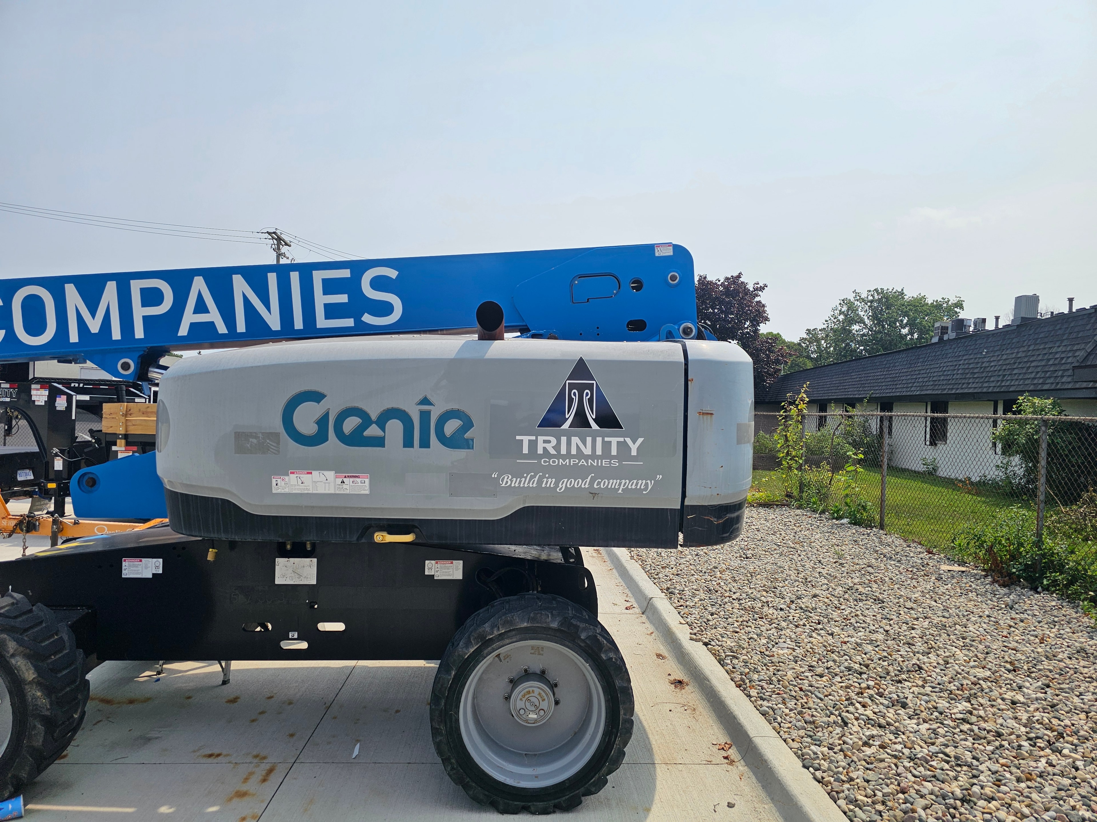 Trinity Companies equipment branding on a Genie lift