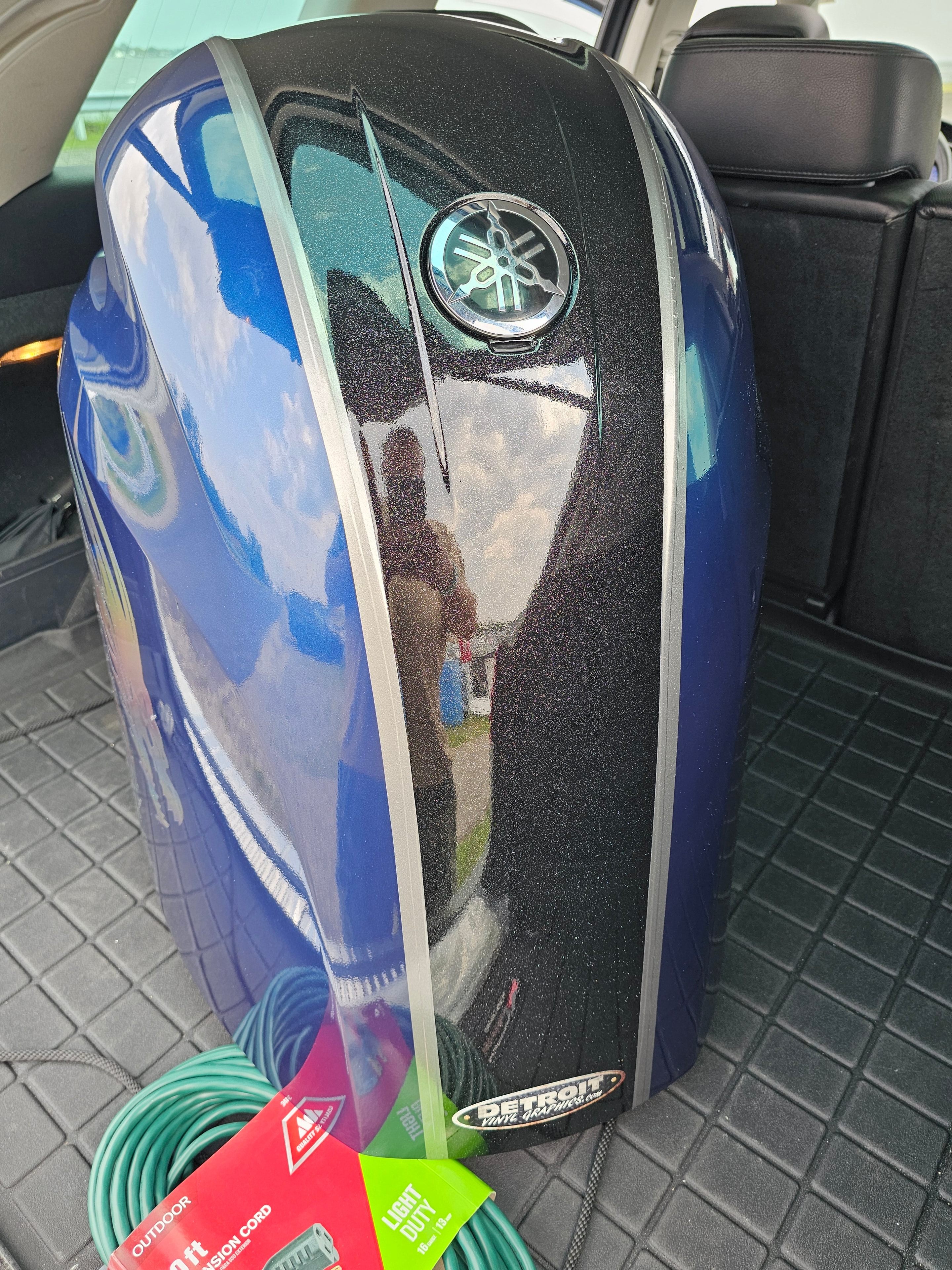 Custom blue and black Yamaha boat motor finish